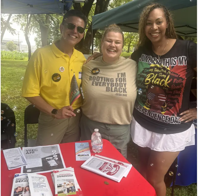Community members at a Knoxville Urban League resource table.