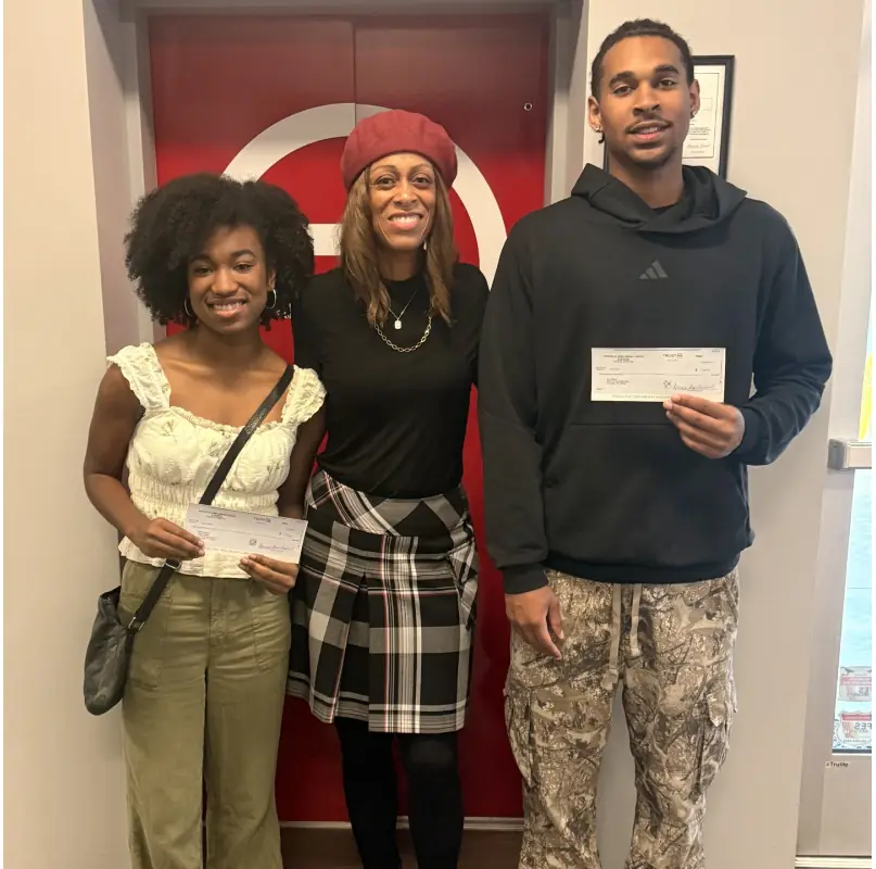 Young people receiving awards at a Knoxville Urban League event.