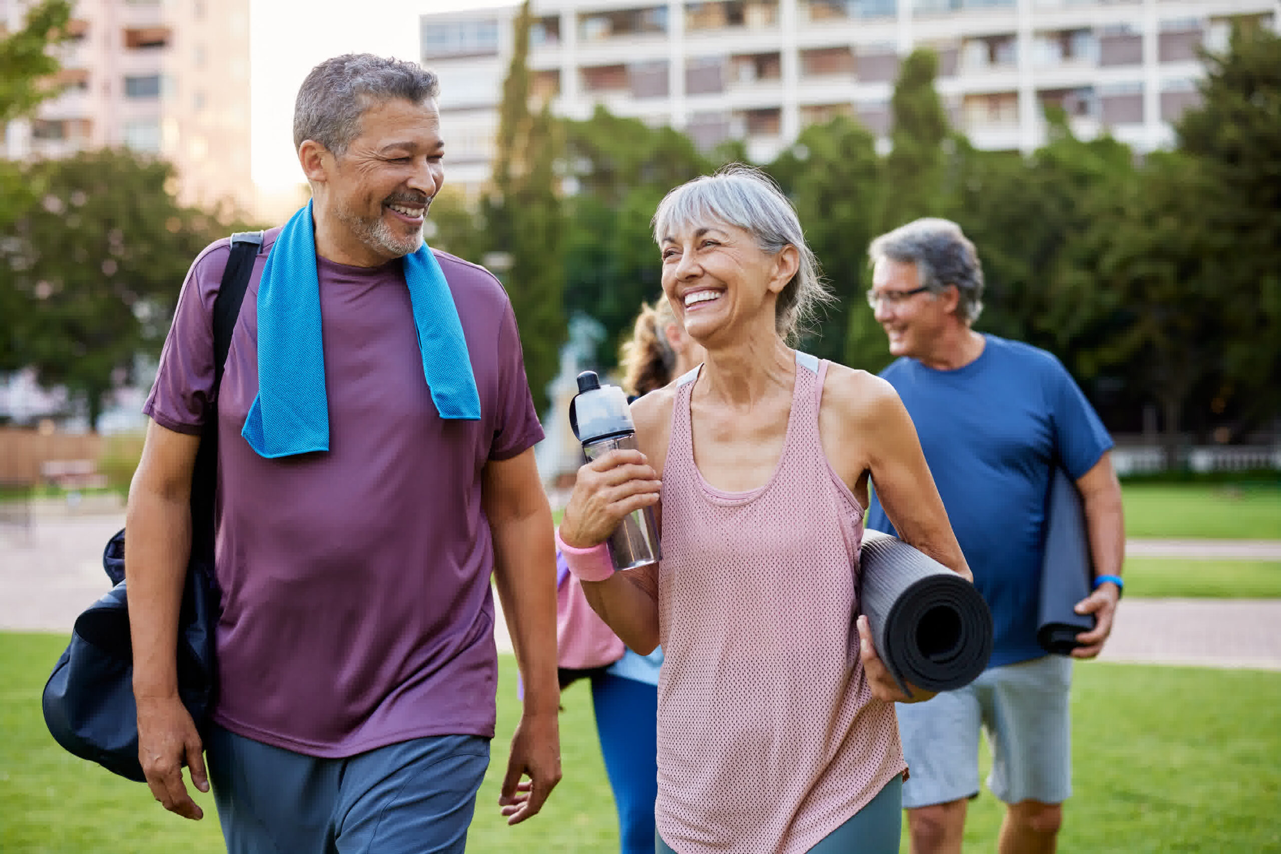 Older adults walking outdoors for fitness